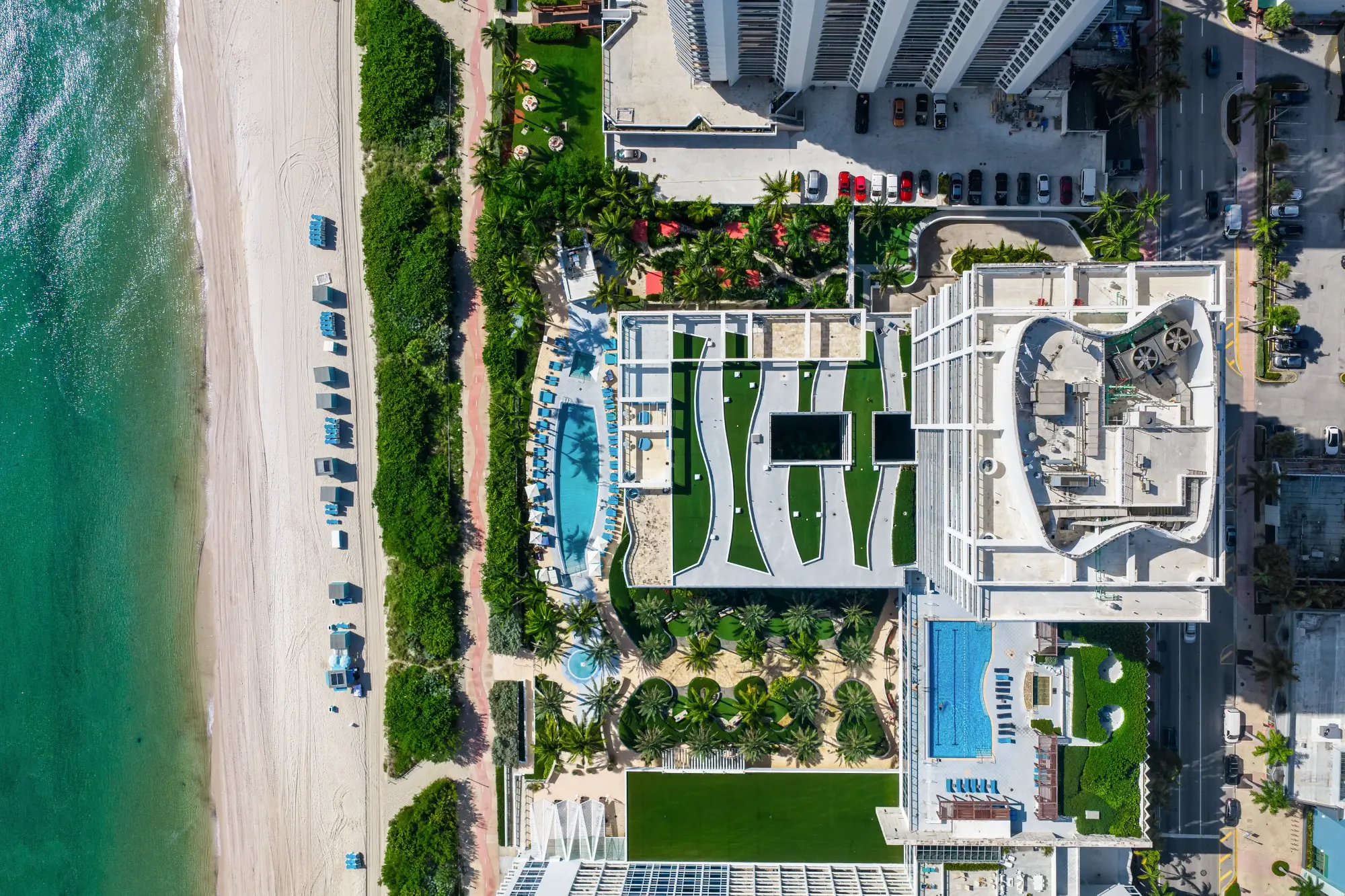 Aerial view of the resort pools and beach